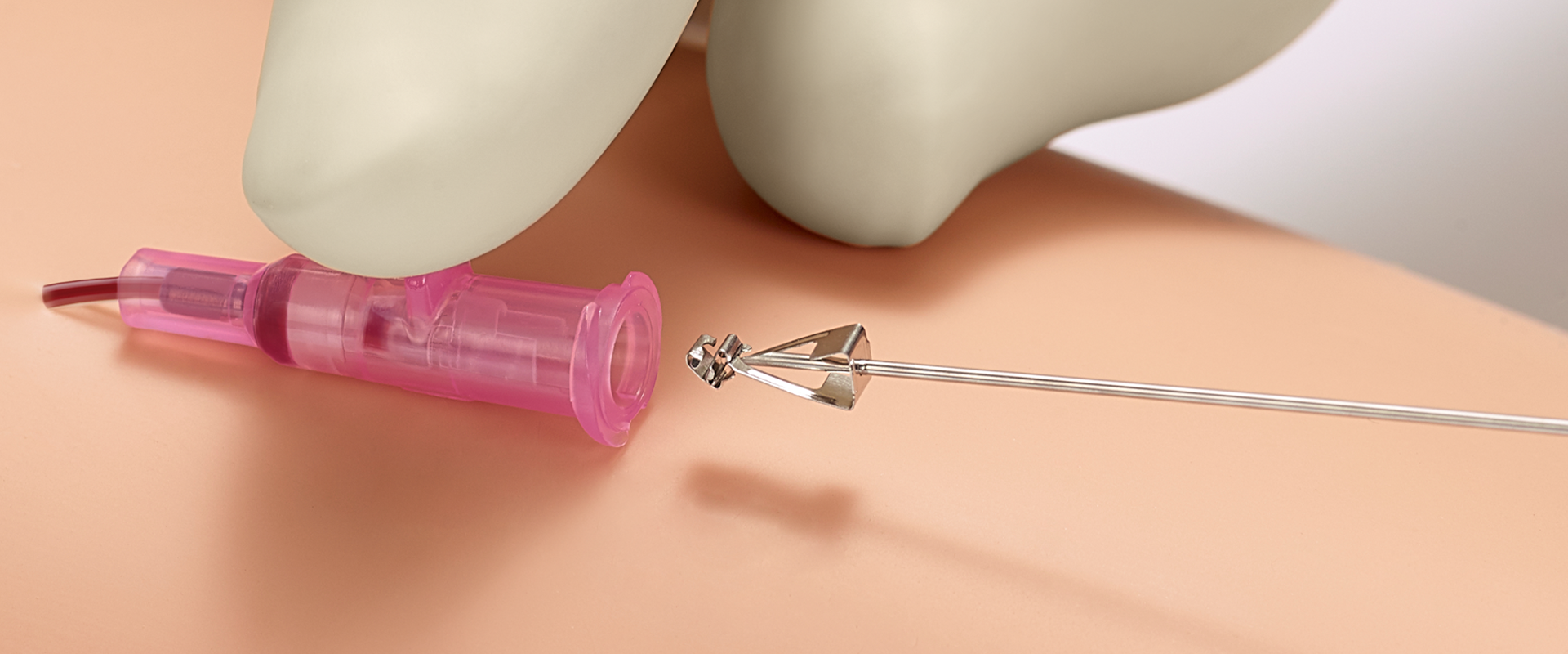 Introcan Safety 2 with multi-access blood control and needle being withdrawn